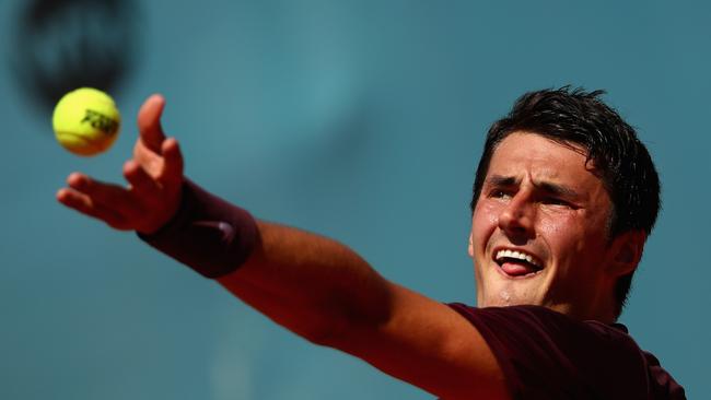 Bernard Tomic says as a kid he would spend anywhere from four hours to nine hour on court training. (Photo by Clive Brunskill/Getty Images)