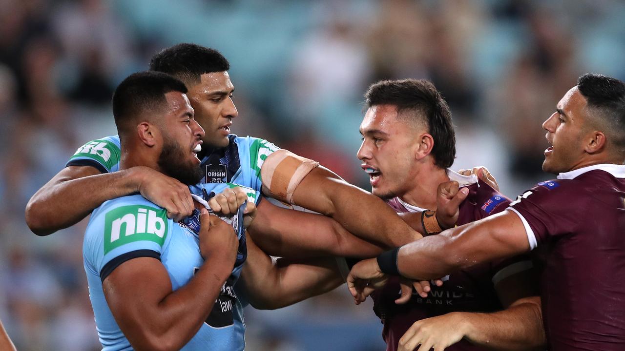 Payne Haas and Tino Fa'asuamaleaui square up in Origin II.