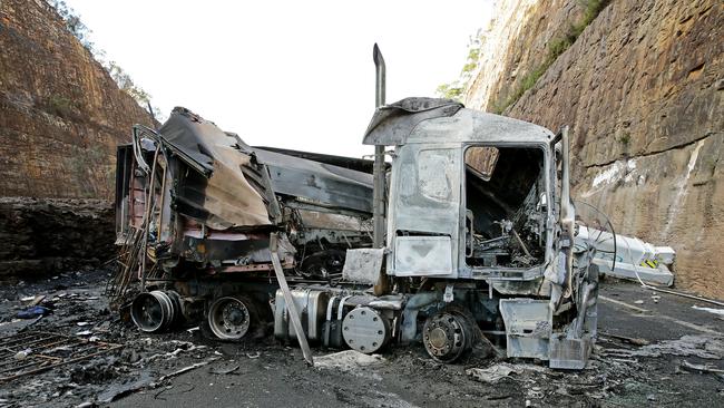 Trucks that crashed and caught fire, blocking the northbound lane on the M1 motorway just south of the Hawkesbury River Bridge near Brooklyn. Picture: Troy Snook