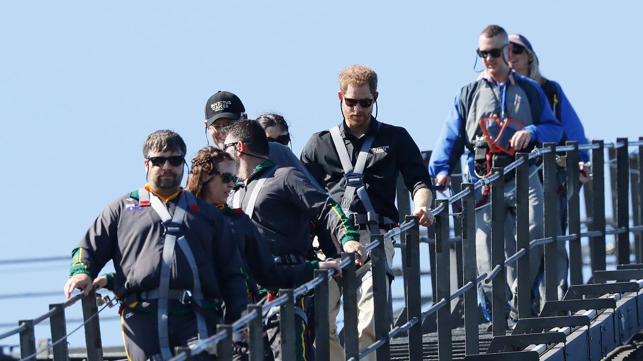 The climbing group make their way back down after climbing the Sydney Harbour Bridge.