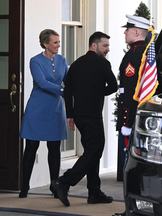 Ukraine's President Volodymyr Zelensky leaves the White House.