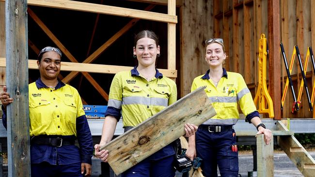 The Queensland Government has opened a new facility at Portsmith under the Homes For Queenslanders program, building modular housing for Far North Queensland communities. QBuild apprentices Jade Elu, Hunter O'Donnell and Madi McDonald work on the first of 10 modular houses, which will be built in Cairns and trucked to Cooktown. Picture: Brendan Radke