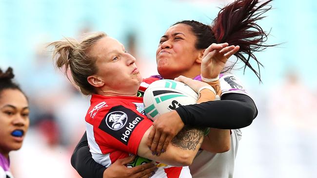 Holli Wheeler is tackled by Crystal Tamarua of the Warriors during the 2019 season of the women’s NRL.