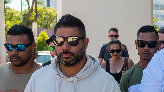 Daniel Mark Keelan, centre, leaves Darwin Local Court after being charged with drug offences.