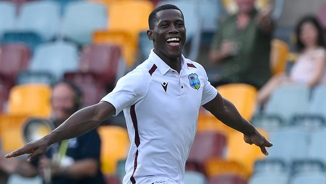 BRISBANE, AUSTRALIA - JANUARY 28: Shamar Joseph of the West Indies celebrates victory after taking the wicket of Josh Hazlewood of Australia during day four of the Second Test match in the series between Australia and West Indies at The Gabba on January 28, 2024 in Brisbane, Australia. (Photo by Bradley Kanaris/Getty Images)