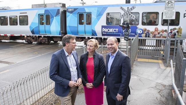 Josh Frydenberg with Cities Minister Alan Tudge and Higgins candidate Katie Allen. Picture: AAP