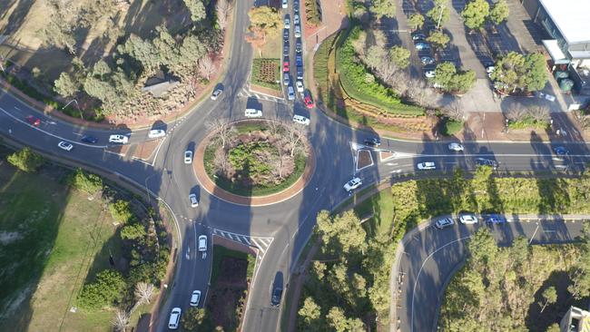 Traffic at the roundabout intersection of Lexington Drive and Norwest Blvd, Bella Vista. Cinemair Aerial Photography (cinemairap.com.au)