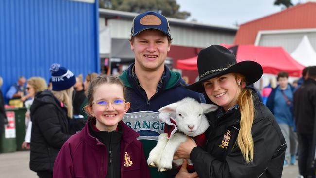 Amelia Phelan Year 7 and Zac Smith and Tess Runting farm manager at the Flinders Christian Community College. Picture: Zoe Phillips