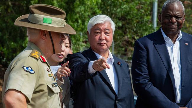 US Defence Secretary Lloyd Austin (right) and Japanese Defense Minister Gen Nakatani (centre) mingled with local troops before holding their meeting. Picture: Pema Tamang Pakhrin