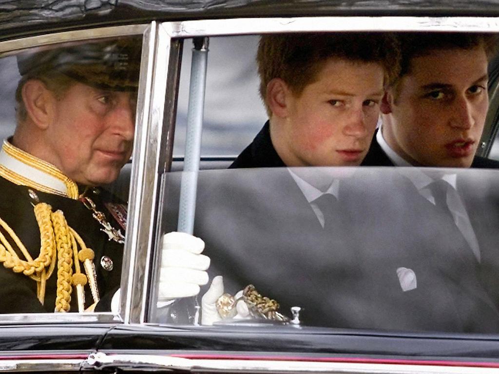 Prince Charles, Harry and William farewelled The Queen Mother in 2002. Picture: AFP