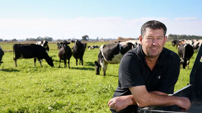 Family tradition: John Keely on his dairy farm at Cohuna in northern Victoria, part of which has been in his family since 1874. Picture: Andy Rogers