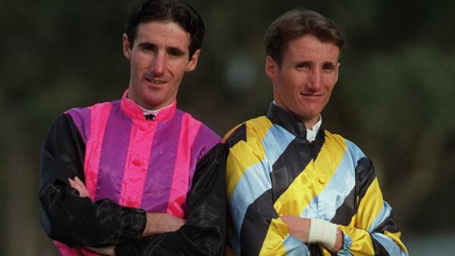 Damien Oliver (right) says his brother, Jason (left), landed him his first winner in the saddle.