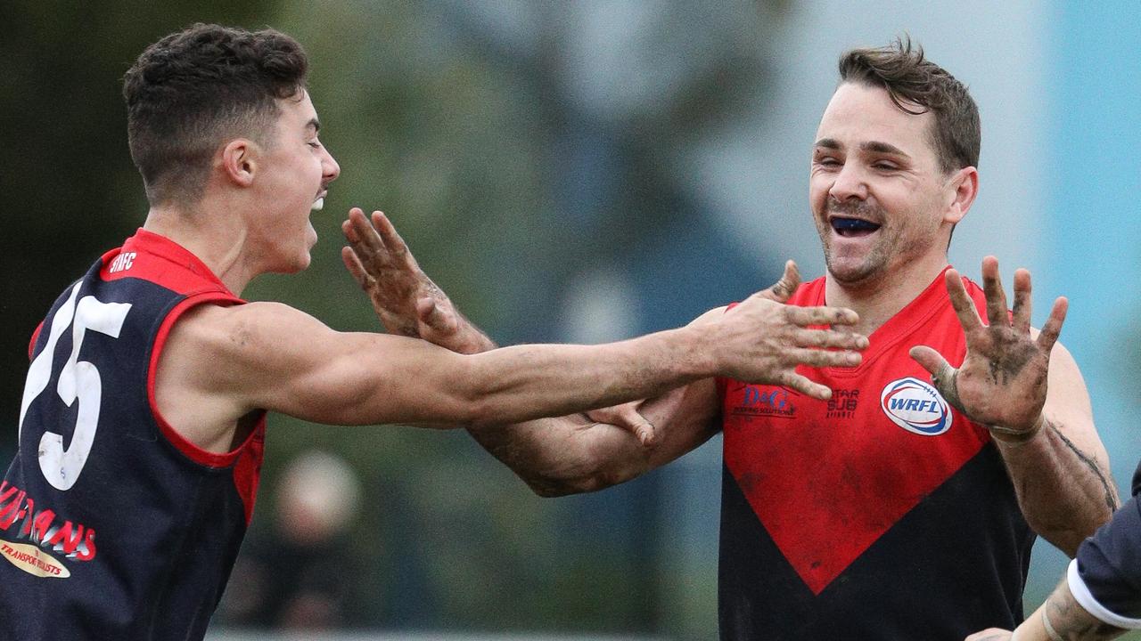 St Albans star Tim Jenkins (right) celebrates a goal. Picture: Local Legends Photography