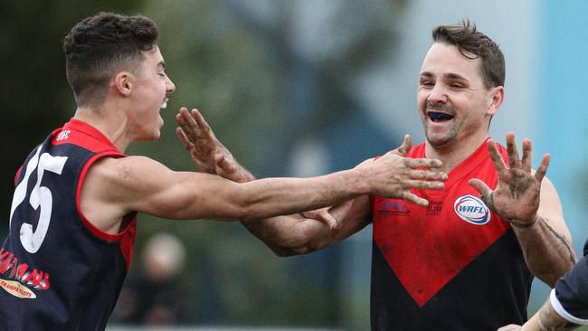 St Albans star Tim Jenkins (right) celebrates a goal. Picture: Local Legends Photography