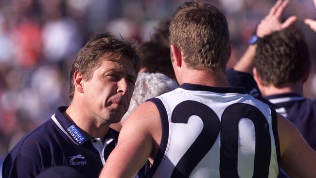 Geelong coach Mark Thompson speaks with Steve Johnson — let’s hope he listened to the message.