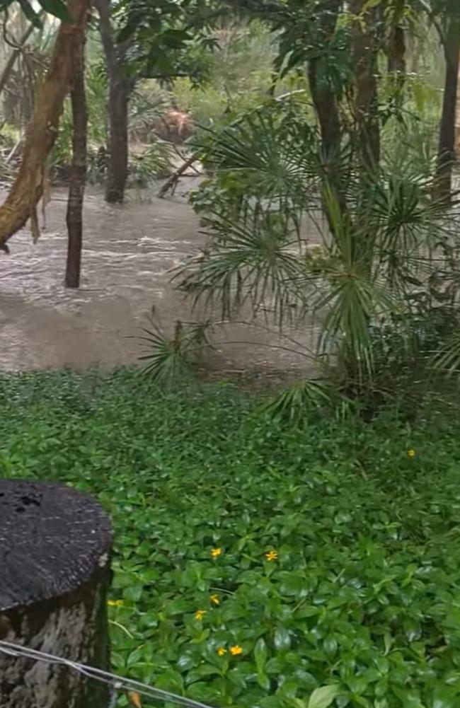 Facebook user Naomi Luzon shared this photo of flooding behind her house at Alligator Creek, Mackay, January 12, 2023.