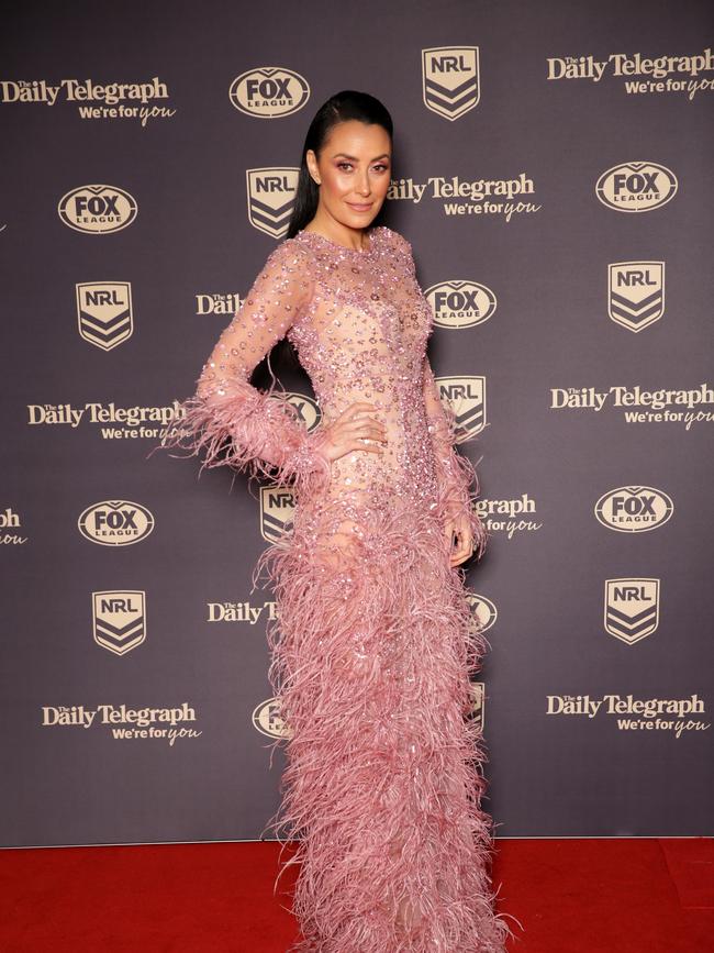 The top WAG caught the eye in a pink gown. Picture: Christian Gilles