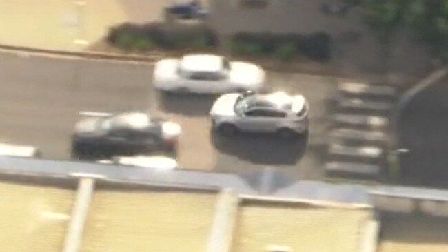 The car zoomed through traffic.