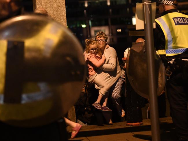 People are lead to safety on Southwark Bridge away from London Bridge. Picture: Getty