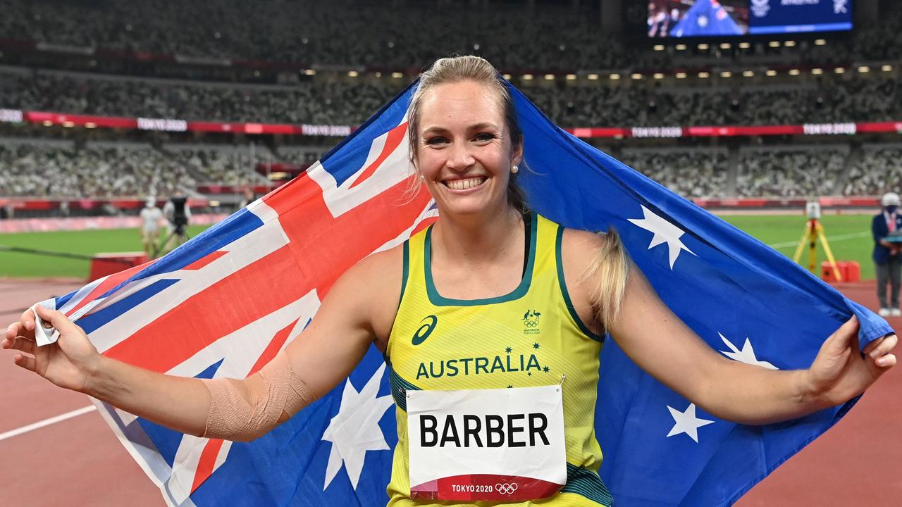 Kelsey-Lee Barber shows her Aussie pride after claiming javelin bronze. Picture: AFP