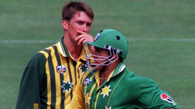 Matthew Hayden and Glenn McGrath clash mid-pitch.