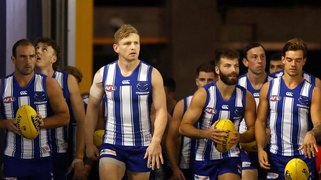 MELBOURNE, AUSTRALIA - APRIL 11: Jack Ziebell of the Kangaroos leads his team up the race during the 2021 AFL Round 04 match between the North Melbourne Kangaroos and the Adelaide Crows at Marvel Stadium on April 11, 2021 in Melbourne, Australia. (Photo by Michael Willson/AFL Photos via Getty Images)