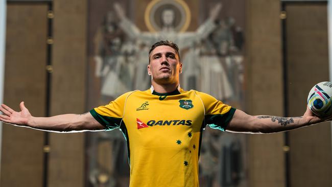 The Australian rugby union team train at the University of Notre Dame, Indiana, USA. Back rower Sean McMahon poses in front of Notre Dame's 'Word of Life' mural, better known as Touchdown Jesus.