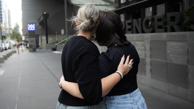 The victim of the attempted abduction with her mother outside police headquarters in Melbourne. Picture: Nicki Connolly