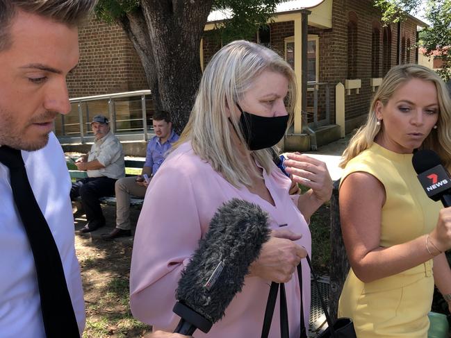 Outside Picton Local Court where a relative (centre) of Latia Henderson arrived for the young woman’s appearance. Picture: Perry Duffin