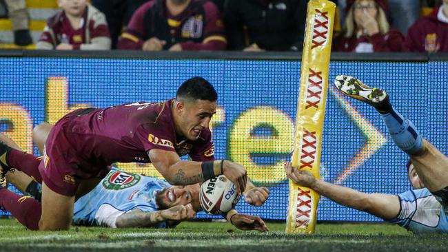 Valentine Holmes crossed for three tries against the Blues.