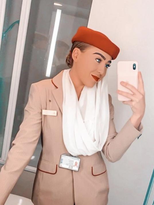 The beauty works as a flight attendant.