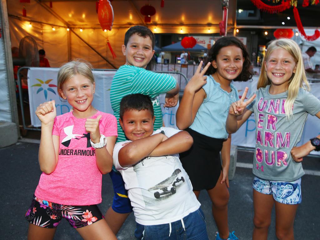 Hayley Graham, Lincoln Martin, Reuben Martin, Mikaylee Martin and Bianca Graham at the Cairns and District Chinese Association Inc Chinese New Year street festival on Grafton Street. PICTURE: BRENDAN RADKE