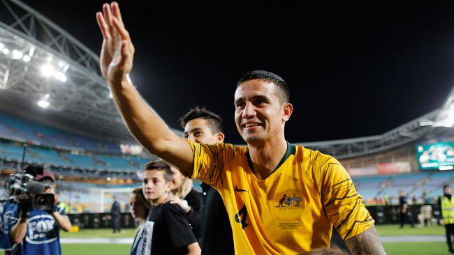 Tim Cahill waves to fans after his 108th and final appearance for the Socceroos on Tuesday night. Picture: AFP