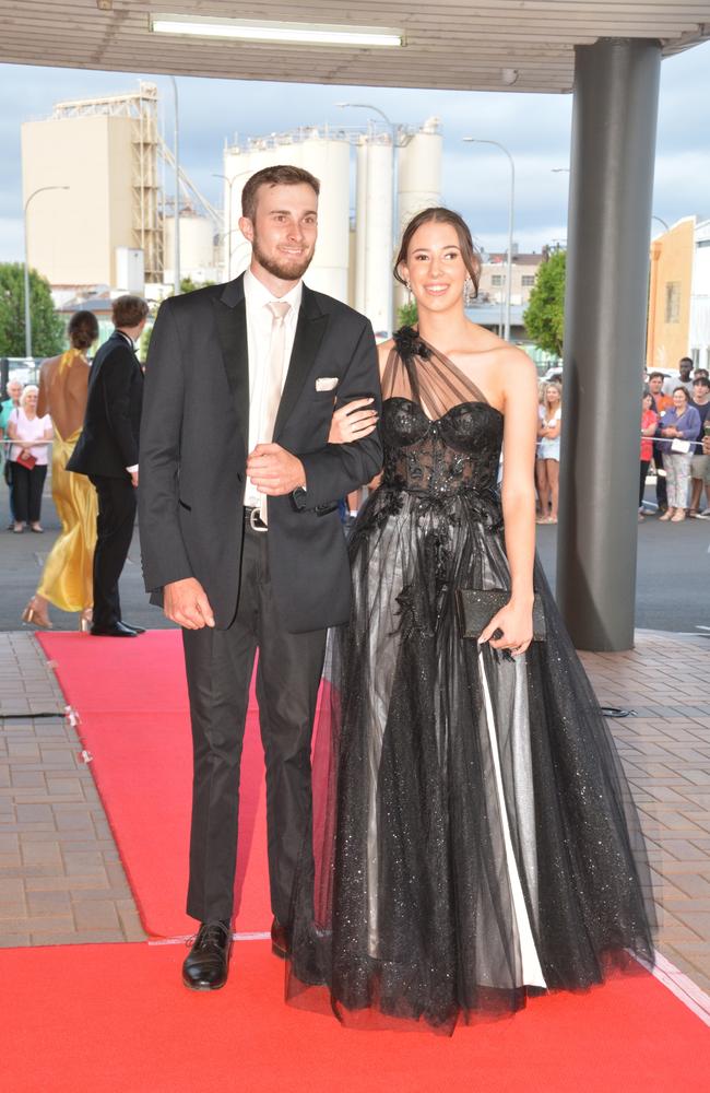 Toowoomba school formals. At the 2023 St Ursula's College formal is graduate Ella Maher with her partner. Picture: Rhylea Millar