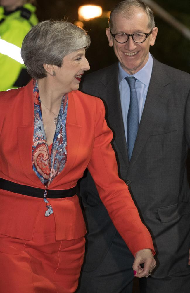 Mrs May and husband Philip arrive for the election count at a leisure centre in her seat of Maidenhead, which she held. Picture: Matt Cardy/Getty Images