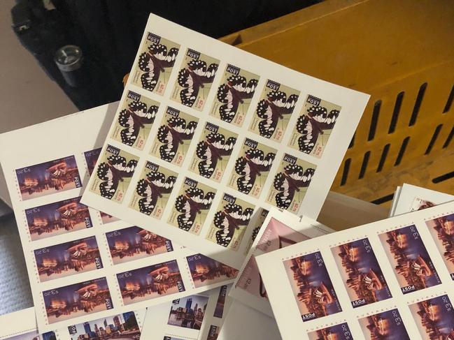 The counterfeit postal stamps seized at the Perth home of fugitive James Balcombe. Photo: Supplied