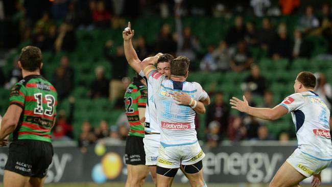 Ashley Taylor celebrates kicking a field goal in golden point to win the game for the Titans.