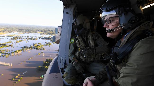 Prime Minister Scott Morrison inspects damage created by floodwaters. Picture: AAP Image