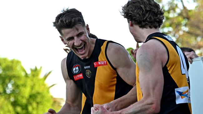 Heidelberg players celebrate on the final siren. Picture: Andy Brownbill