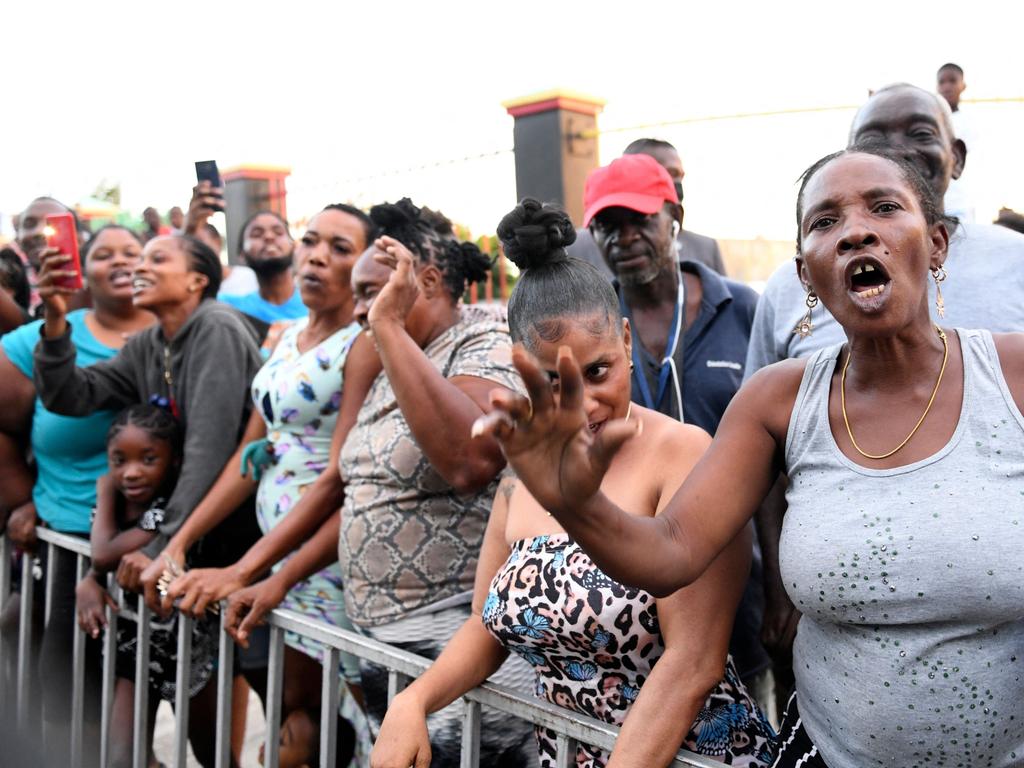 People protest the visit of the Duke and Duchess of Cambridge in Kingston, Jamaica. Picture: AFP