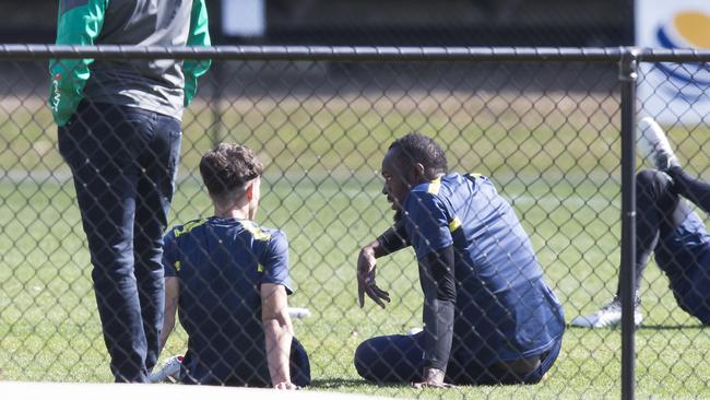 Usain Bolt on the sidelines during Central Coast Mariners training on Wednesday. Picture: Dylan Robinson