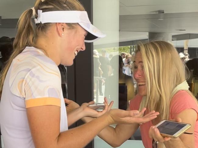 Olivia Gadecki greets her mother Natalia off-court after winning her opening round match at the Australian Open.