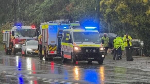 Emergency services attending crash in the rain at Pembroke and Minto Rd intersection. Picture: Facebook