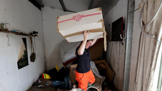 Nancy was elated to find her wedding dress had survived after she put the box it was in up on a mezzanine level in their shed. Picture: Toby Zerna