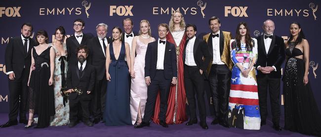 The cast of "Game of Thrones," winners of the award for outstanding drama series, pose in the press room at the 71st Primetime Emmy Awards. Picture: AP