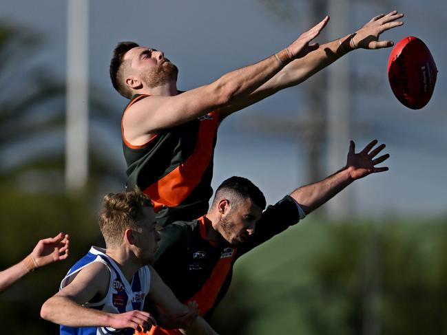 EDFL: Keilor Park’s Daylan Kempster flies over the pack. Picture: Andy Brownbill