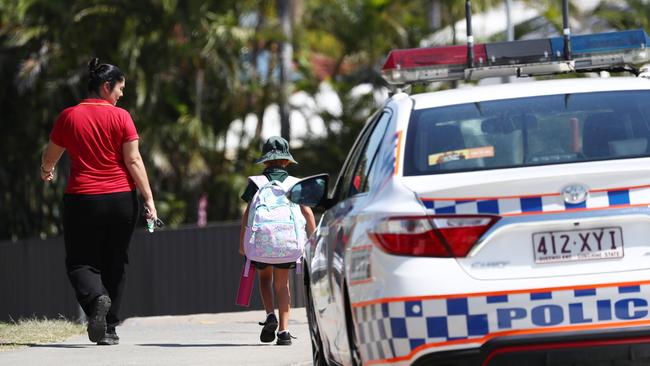 Scenes outside Helensvale Primary School after it went into lockdown. Photograph: Jason O'Brien