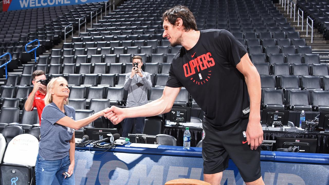 OKLAHOMA CITY, OK - OCTOBER 30: Actress, Kristin Chenoweth poses for a photo with Boban Marjanovic #51 of the LA Clippers before the game against the Oklahoma City Thunder on October 30, 2018 at Chesapeake Energy Arena in Oklahoma City, Oklahoma. NOTE TO USER: User expressly acknowledges and agrees that, by downloading and/or using this photograph, user is consenting to the terms and conditions of the Getty Images License Agreement. Mandatory Copyright Notice: Copyright 2018 NBAE (Photo by Andrew D. Bernstein/NBAE via Getty Images)