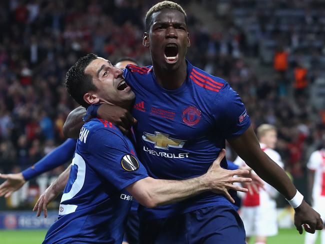 STOCKHOLM, SWEDEN - MAY 24:  Henrikh Mkhitaryan of Manchester United celebrates scoring his sides second goal with Paul Pogba of Manchester United during the UEFA Europa League Final between Ajax and Manchester United at Friends Arena on May 24, 2017 in Stockholm, Sweden.  (Photo by Julian Finney/Getty Images)