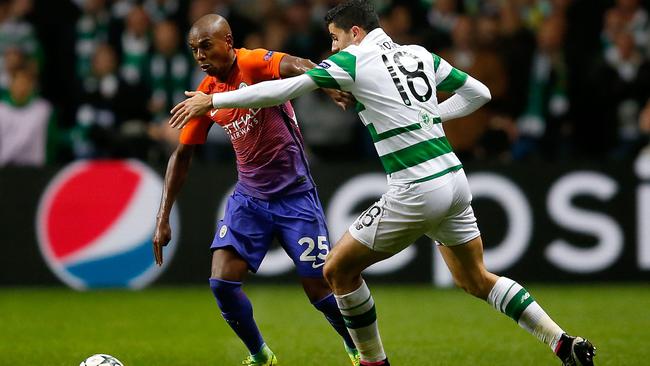 Manchester City's Fernandinho, left, and Celtic's Tom Rogic.